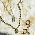 Sw Baguette & Chain Huggie Hoops - Crystal