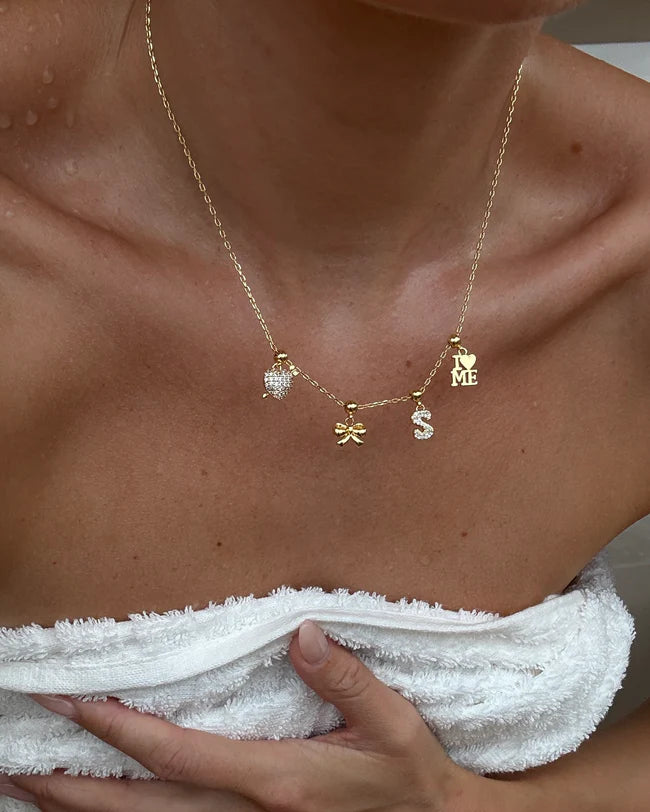 Bow Charm - Guld