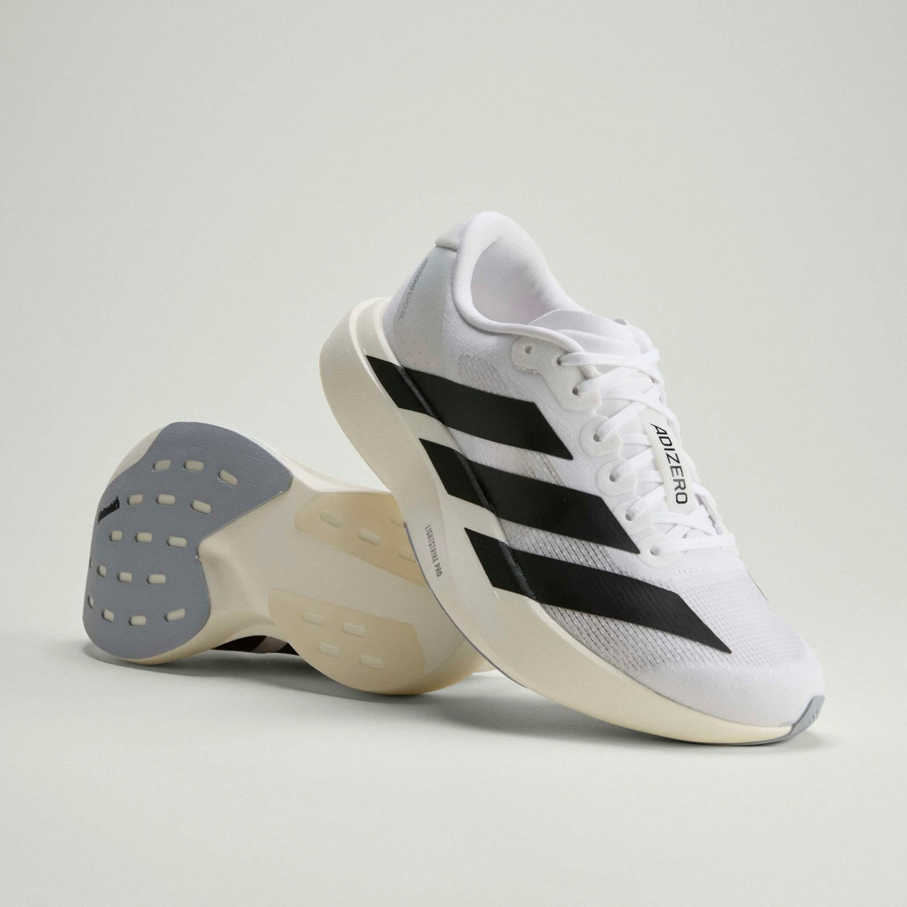 Adizero EVO SL W - Cloud White/Core Black/Cloud White
