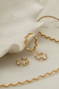 Pave Wave Huggie Hoop - Pale Gold