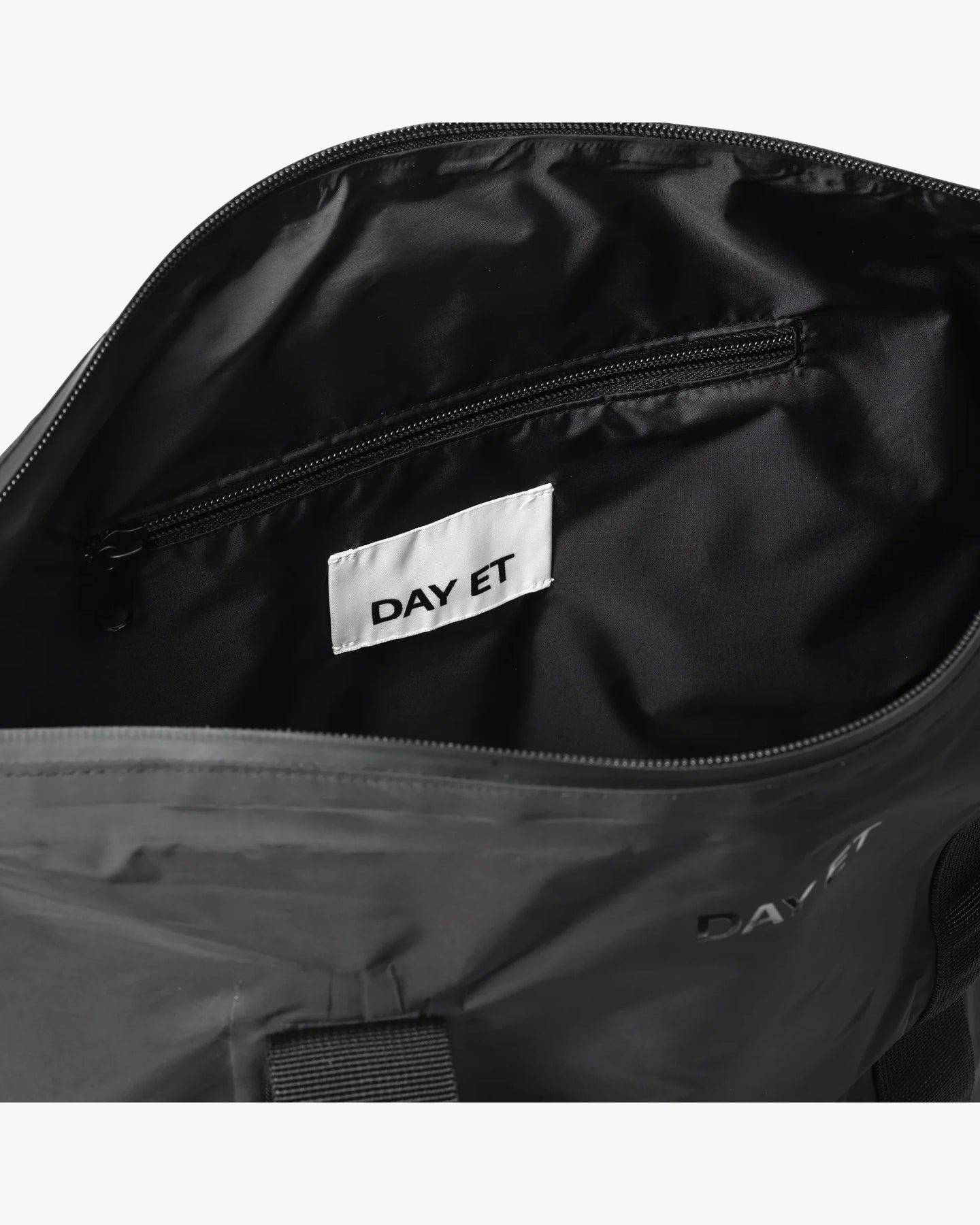 Day Re-No Rain Bag M - Svart
