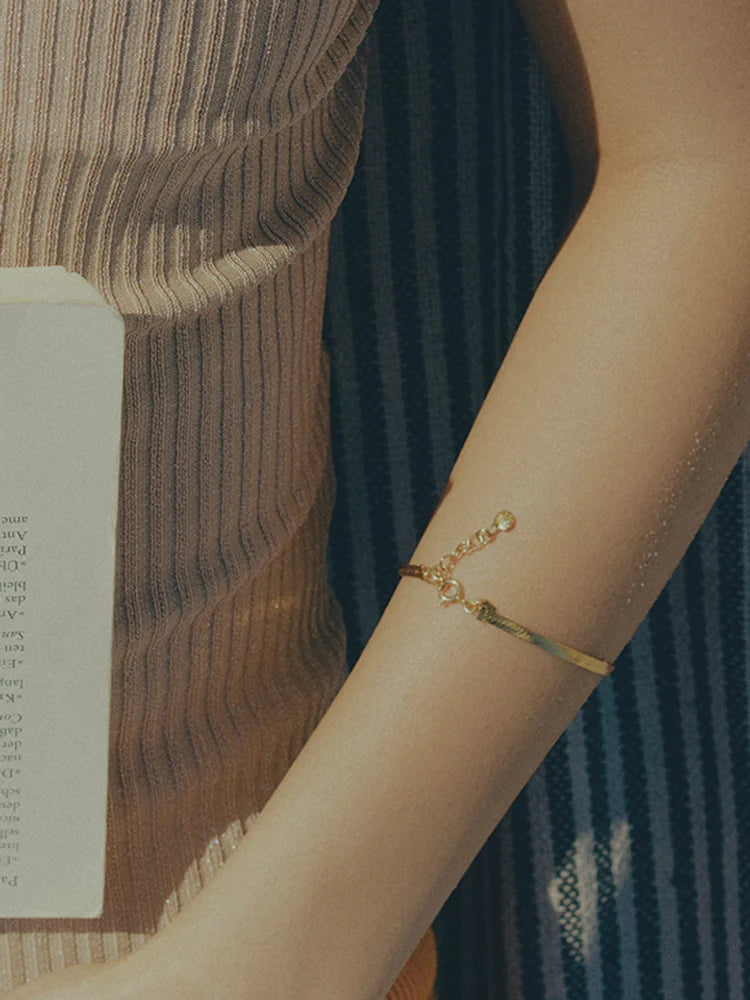 Sentiero Armband (S/M) - Guld